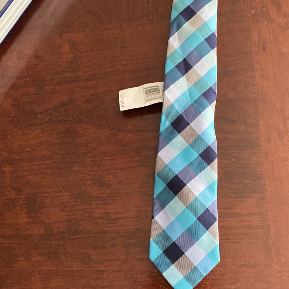 Tommy Hilfiger tie. Never worn. Blue and gray plaid.